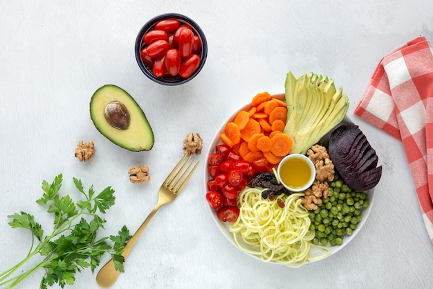 Raw vegan salad with assorted vegetables