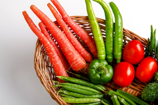 Raw vegetable in wooden basket