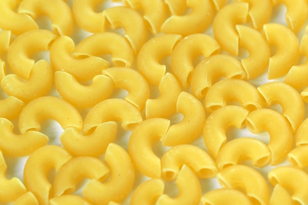 Raw wheat pasta close up