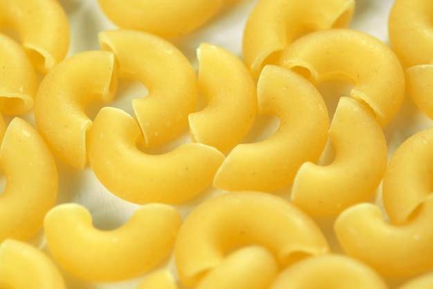 Raw wheat pasta close up