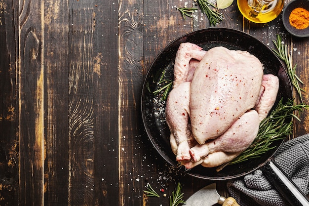 Raw whole chicken ready for cooking