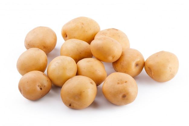 Raw yellow potato isolated on white background