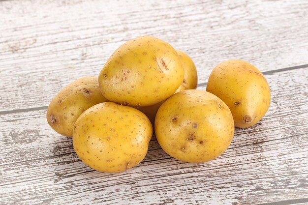 Raw young baby potato heap for cooking