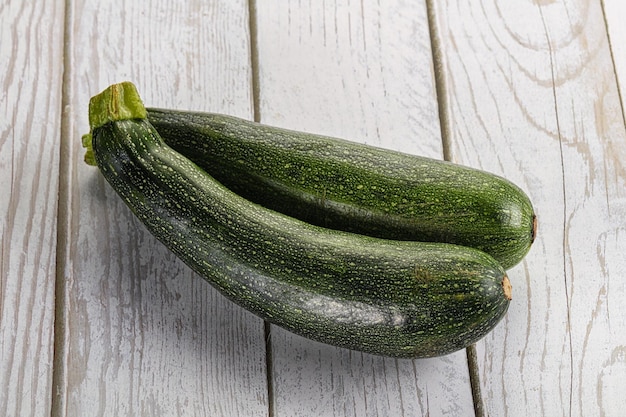 Raw young small green zucchini for cocking