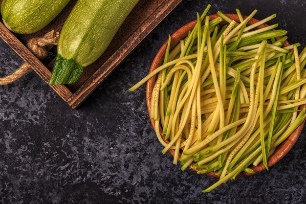 Raw zucchini cut in pasta shape