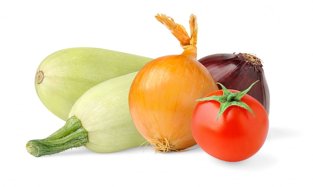 Raw zucchini, onions and tomato isolated