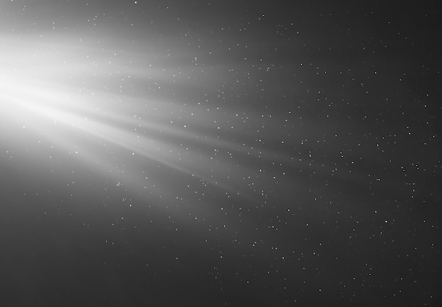 Photo rays of light on a black background with flying particles