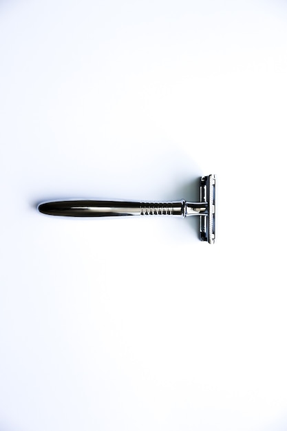 Razor on the table. Stylish men idea for a gift. Barber shop things.