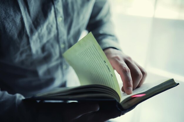 Read book A man sits and reads religion literature Textbooks to study