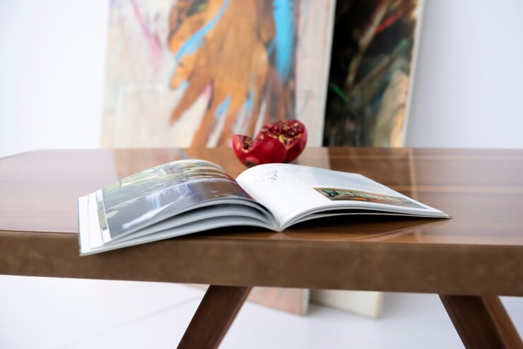 Reading a book and broadening your interests during corona on a luxurious handmade chestnut table with a epoxy resin.