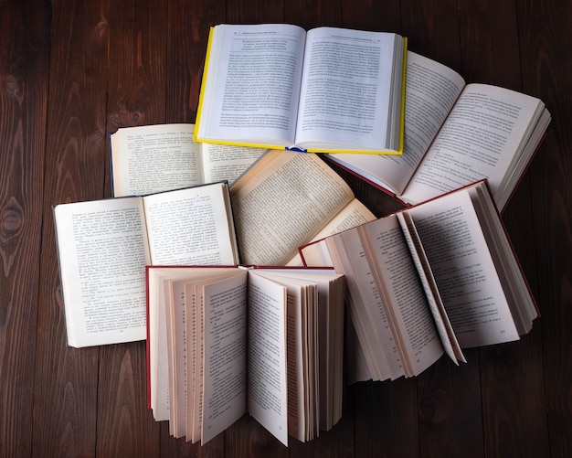 Reading books, books on wooden background