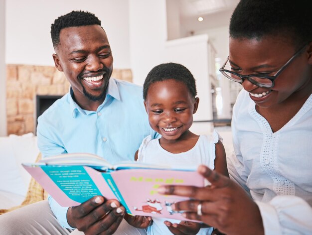 Reading parents and girl with book in living room for bonding quality time and child development Happy family home and mother father and kid on sofa with story fairytale and novel for learning