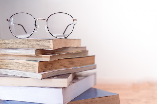 Reading thin frame glasses on book