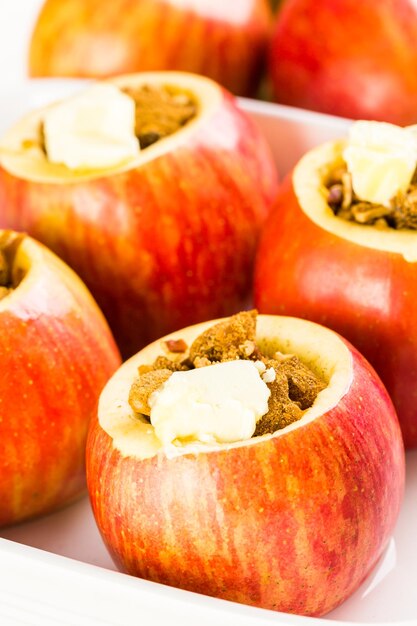 Ready to be baked organic apples with pecans and raisins.