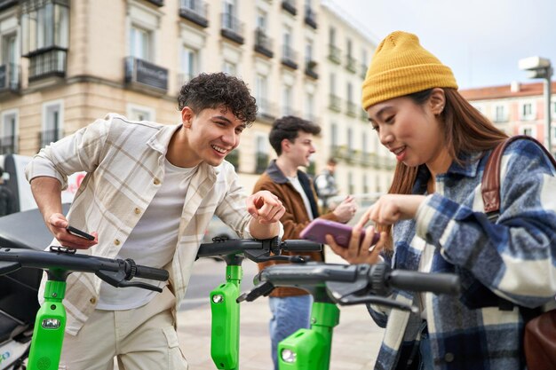 Ready for fun Friends paying for electric skates on vacation