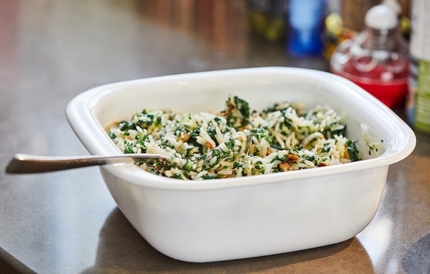 Ready-made filling in white dish for chard pie. Step by step recipe.