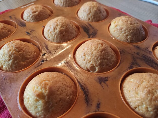 A readymade cupcakes in a baking dish in the kitchen