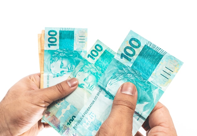 real brazilian currency a businessman holding brazilian real money bills from brazil