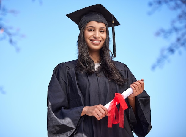 A real chance at making it big Portrait of a young woman holding her diploma on graduation day