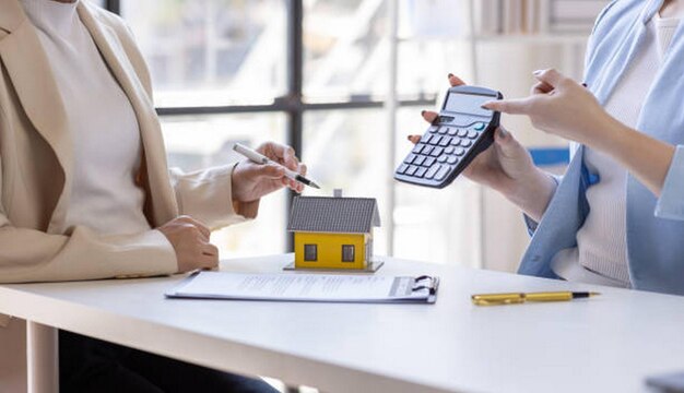 Real estate brokerage agent Deliver a sample of a model house to the customer buy or rent Mortgage property tax insurance dream moving home and real estate concept