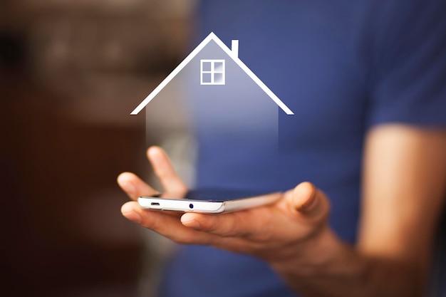 Photo real estate concept businessman showing house icon in hand