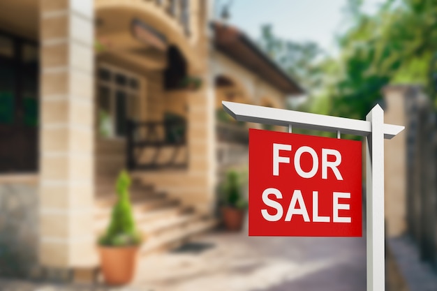 Photo real estate sign in front of new house for sale