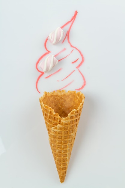 Real waffle cone with marshmallows and hand drawn cream