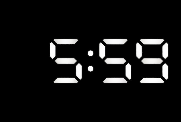 Photo real white led digital clock on a black background showing time 559