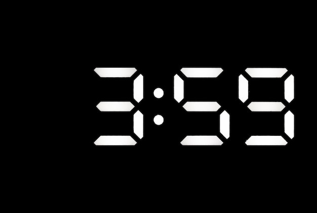 Photo real white led digital clock on black background