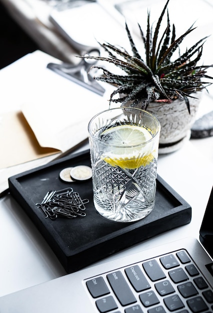 Photo real workspace closeup shot tabletop with succulents laptop keyboard