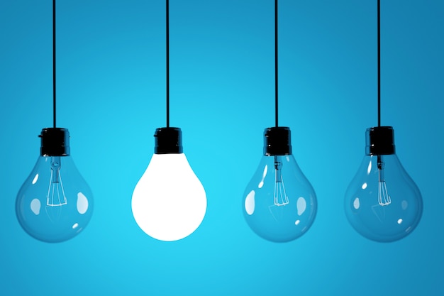 realistic lightbulb in blue background 