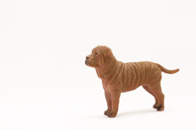 Realistic plastic toy dog