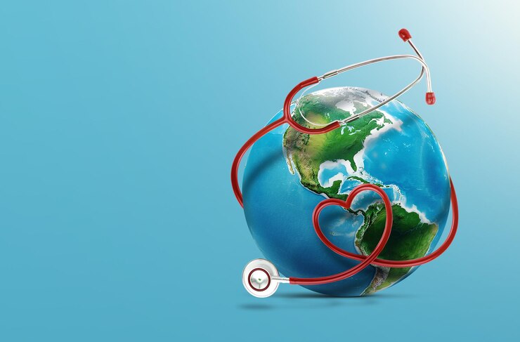 Photo realistic red heart form stethoscope and world with free text space