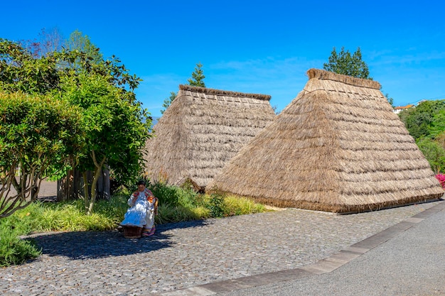 Rear part of two typical houses in the parish of Santana covered with thatched roofs