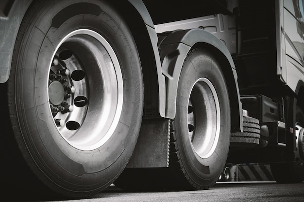 Rear of semi truck wheels tires diesel truck freight trucks\
transport