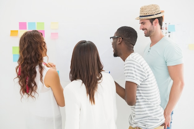 Rear view of coworkers interacting together