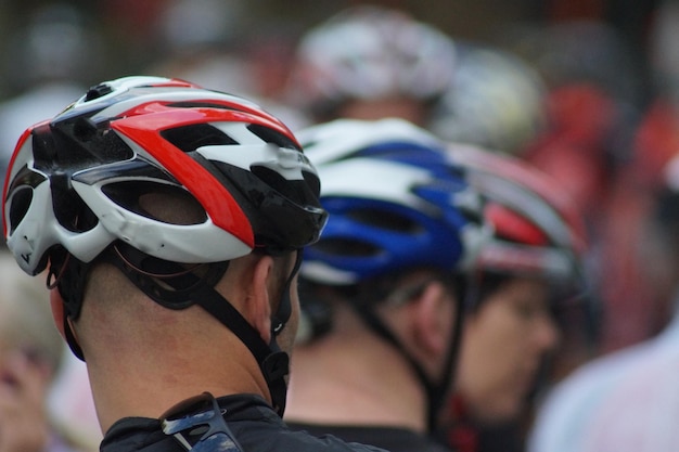 rear view of cyclist wearing helmets