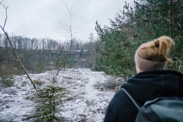 Rear view of man in forest