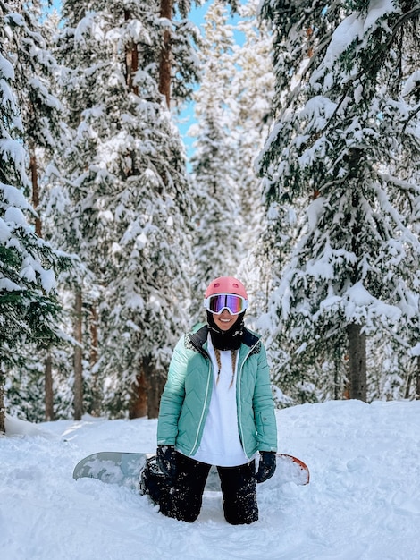 Rear view of man skiing on snow covered field