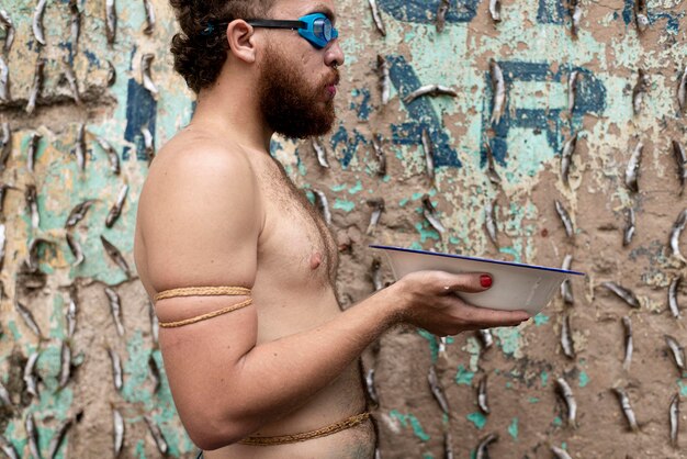 Photo rear view of man standing against wall