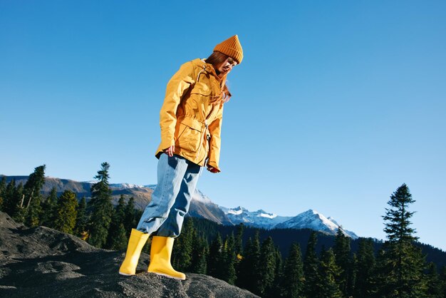 Rear view of man standing on mountain