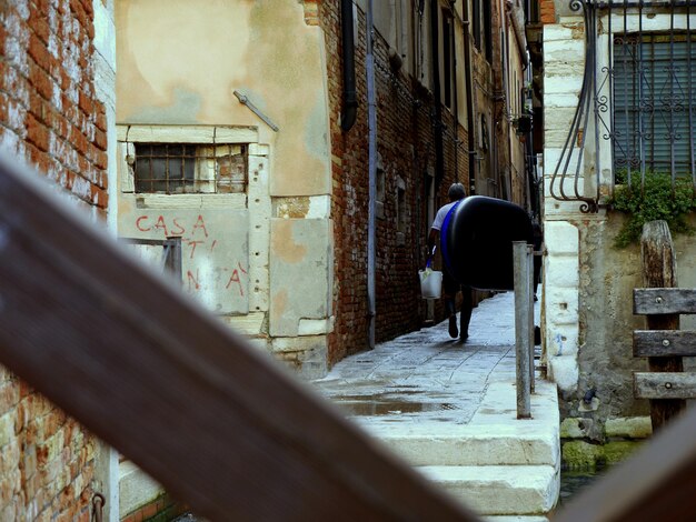 Rear view of man walking in city