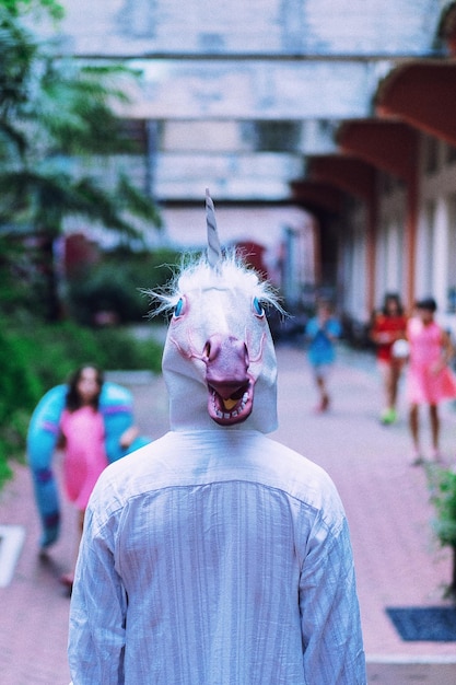 Rear view of man wearing mask