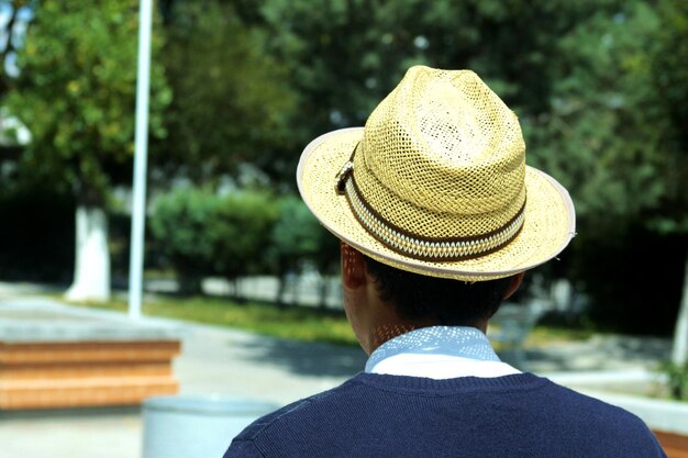 Rear view of man with hat