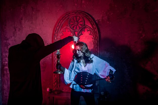 Photo rear view of man and woman standing against red wall