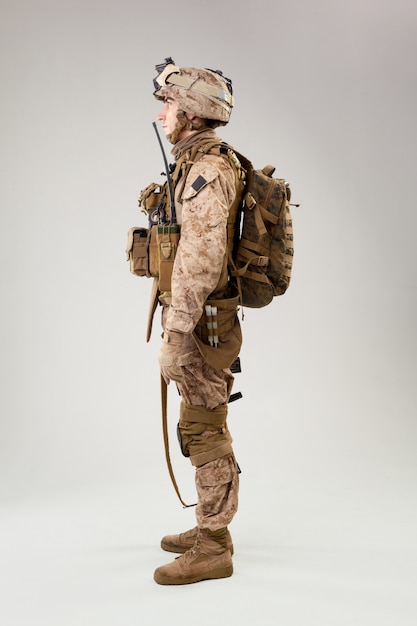 Rear view of military soldier US army marines operator studio shot portrait