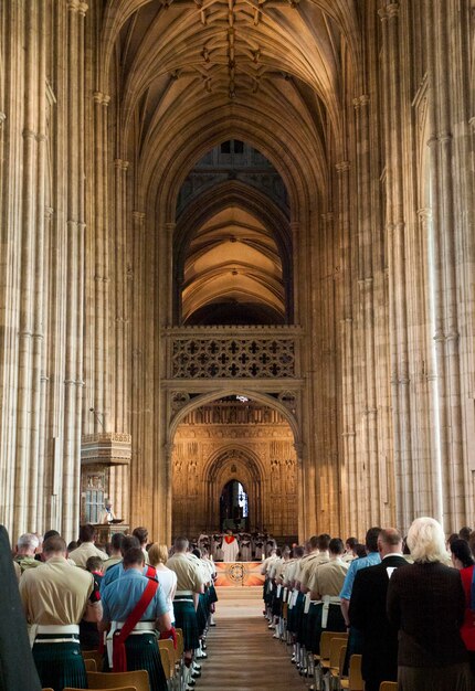 Rear view of people praying in church