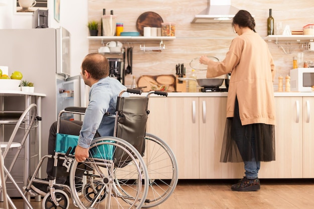 Rear view of people standing on table