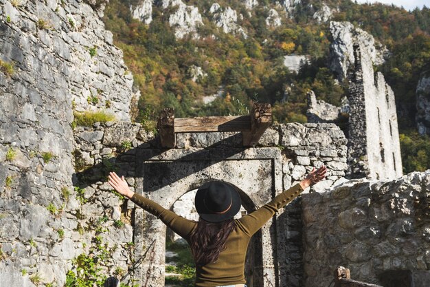 Rear view of person against wall