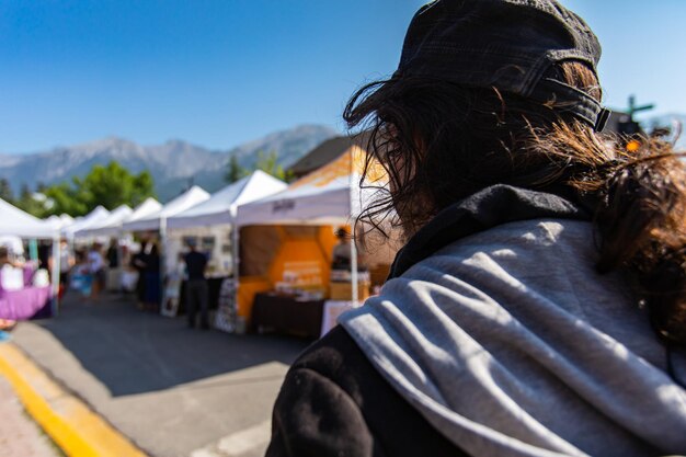 Rear view portrait of woman outdoors